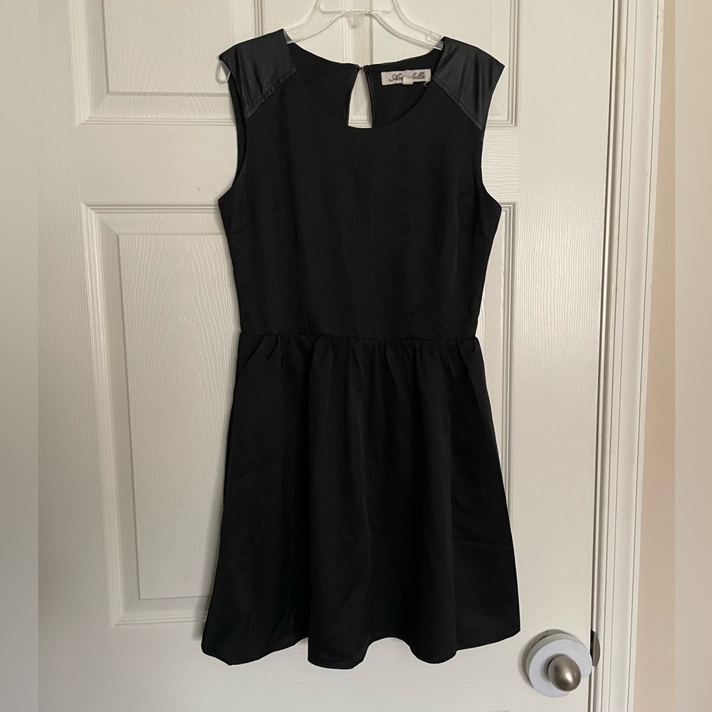 Annabella size small Black Dress with Faux Leather Details and Open Back